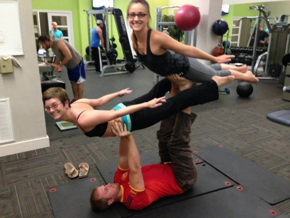 Steve doing acroyoga with his wife